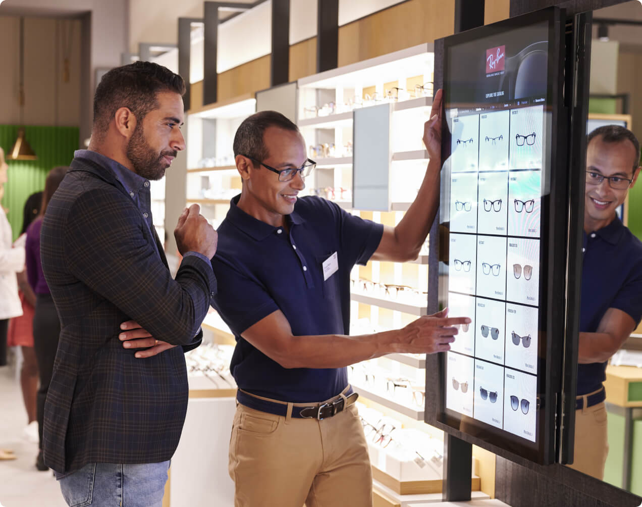 An optometrist showing someone glasses options