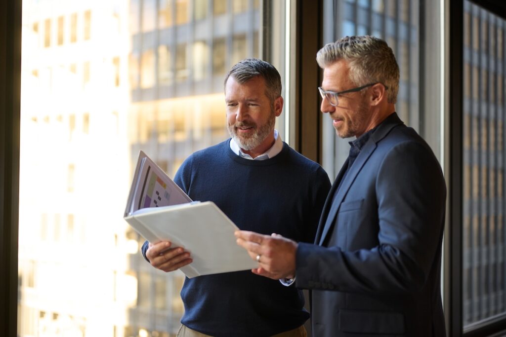 Two business men having an adult conversation.